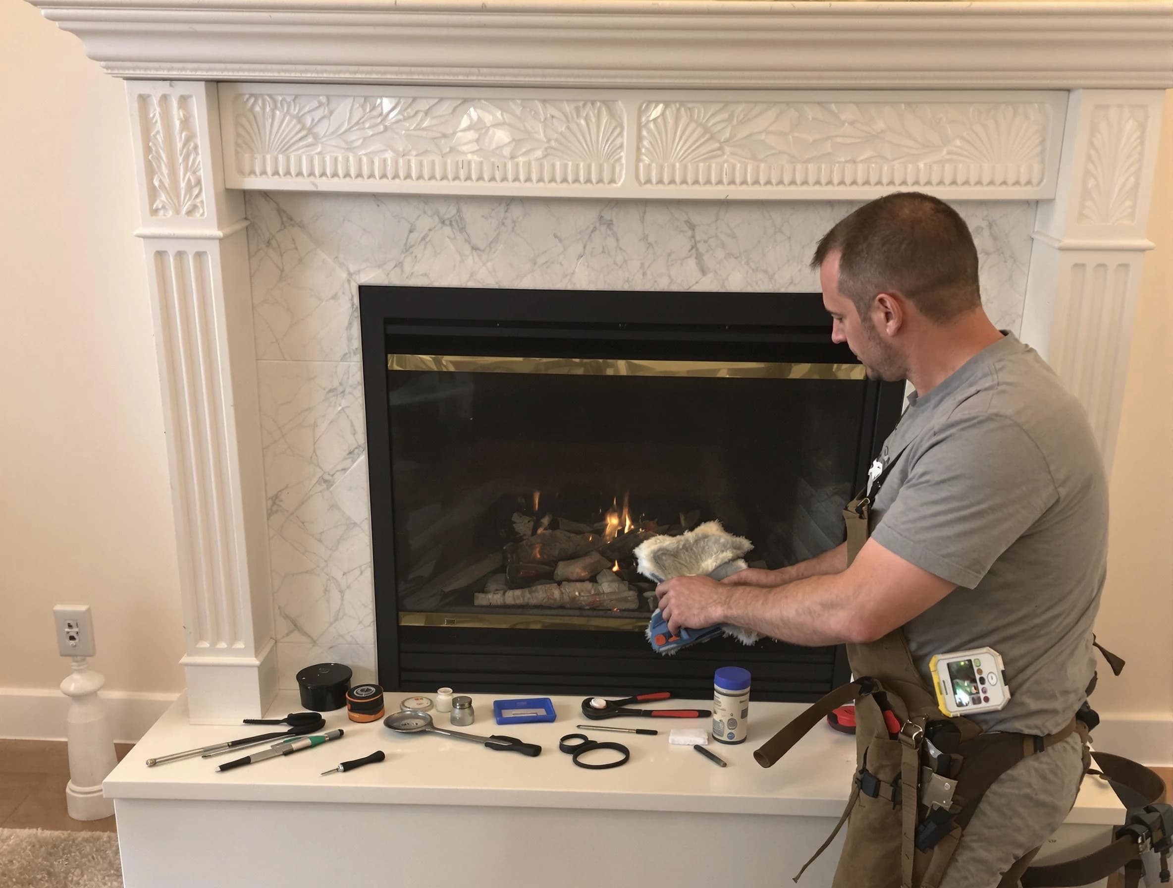 East Brunswick Chimney Sweep performing fireplace maintenance in East Brunswick, NJ